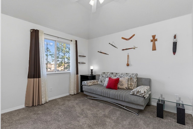 living room featuring ceiling fan, lofted ceiling, and carpet flooring