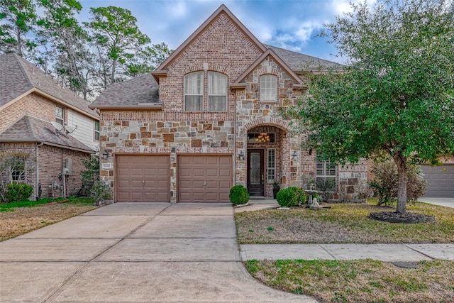 view of front of property featuring a garage