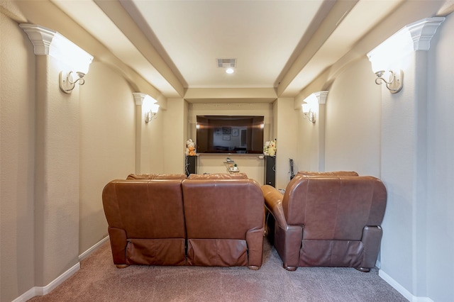 home theater room featuring carpet floors and decorative columns