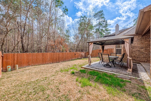 view of yard with a gazebo and a patio area