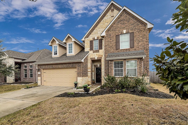 front of property featuring a garage and a front lawn