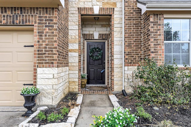 property entrance with a garage