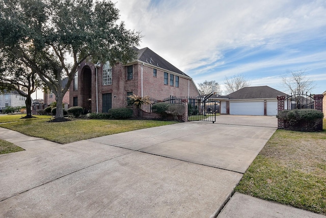 exterior space featuring a garage and a lawn