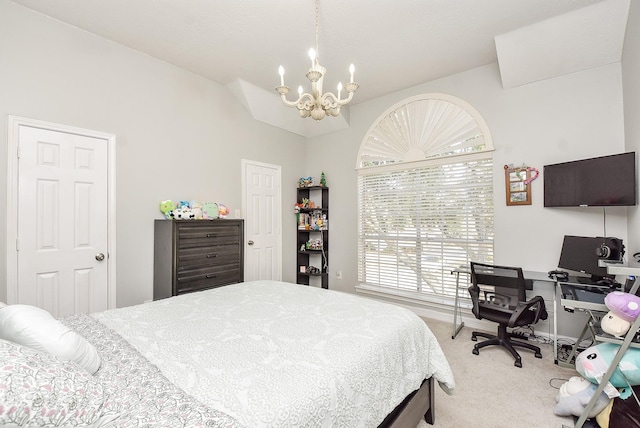 bedroom featuring vaulted ceiling, carpet floors, and a notable chandelier