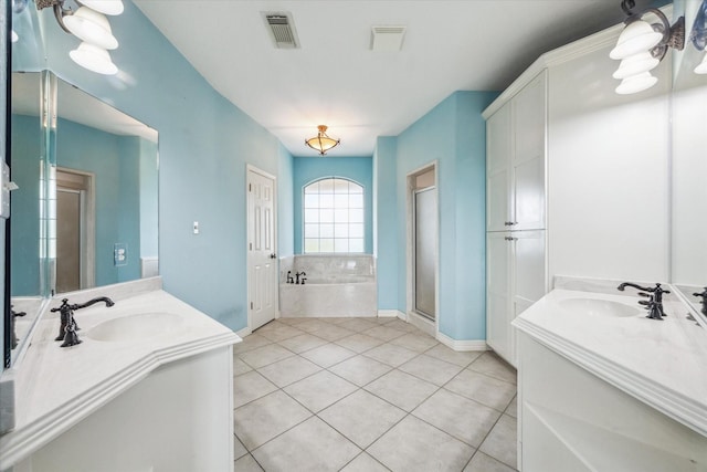 bathroom featuring vanity, plus walk in shower, and tile patterned flooring