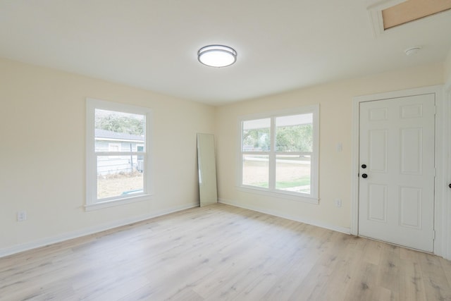 foyer with light wood-type flooring