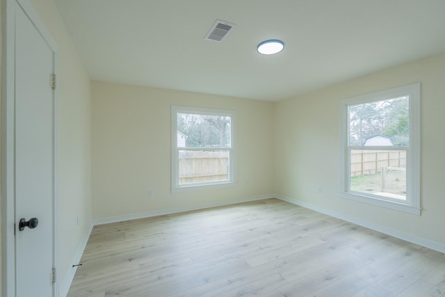 empty room featuring light wood-type flooring