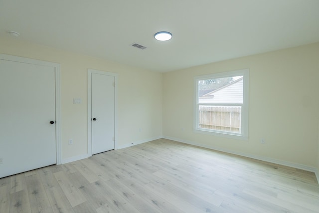 unfurnished bedroom featuring light hardwood / wood-style floors