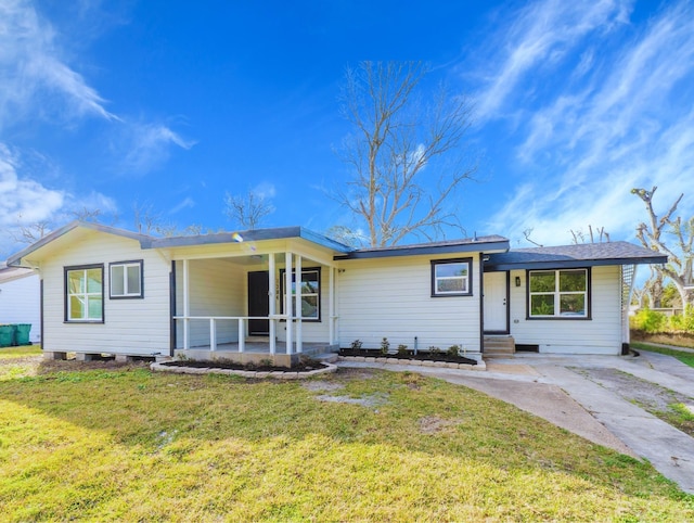 ranch-style house with a front lawn