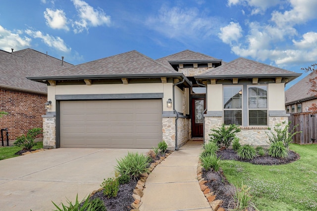 prairie-style house with a garage and a front yard