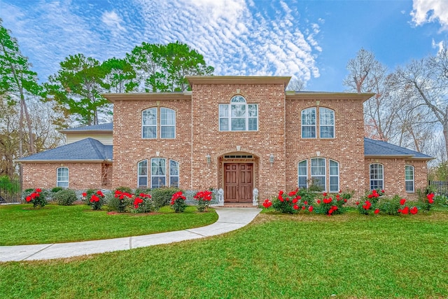 12403 Summer Lake Ranch Dr, Houston, TX 77044 - view of front of house featuring a front lawn and brick siding