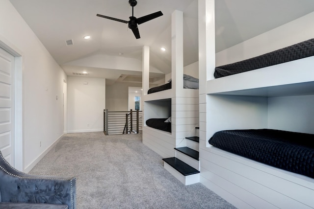 interior space featuring vaulted ceiling and ceiling fan