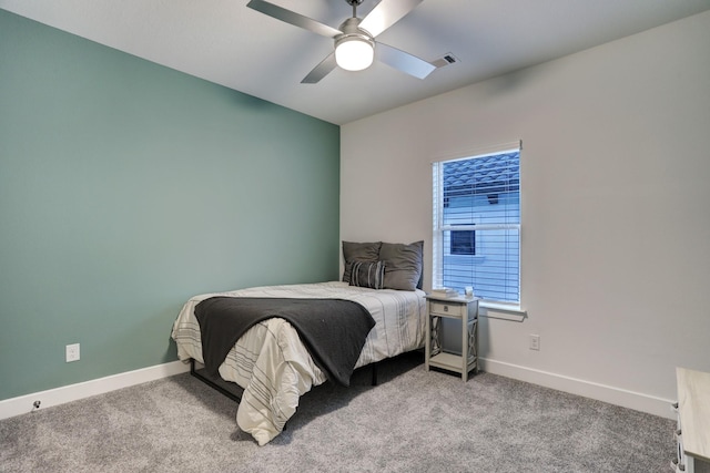 bedroom with ceiling fan and carpet