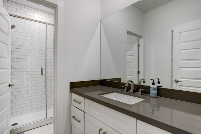 bathroom with vanity and walk in shower