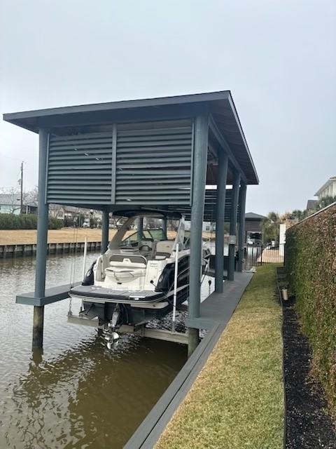 dock area featuring a water view