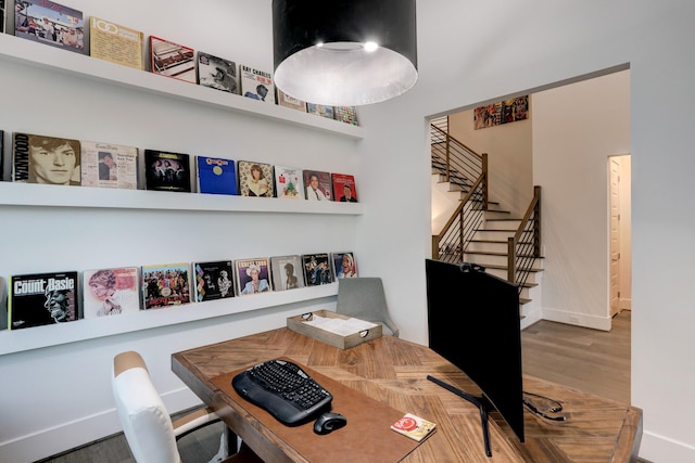 dining area featuring wood-type flooring