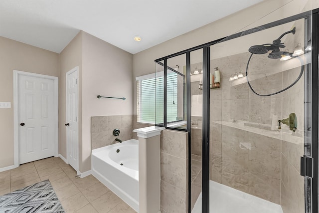 bathroom featuring tile patterned flooring and plus walk in shower