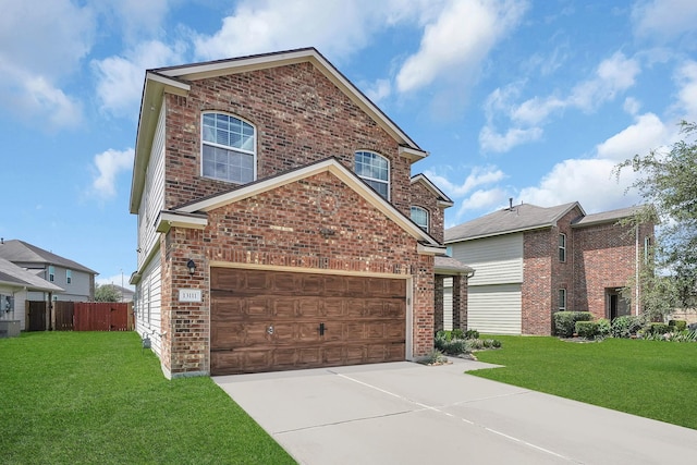 view of property with a garage and a front yard