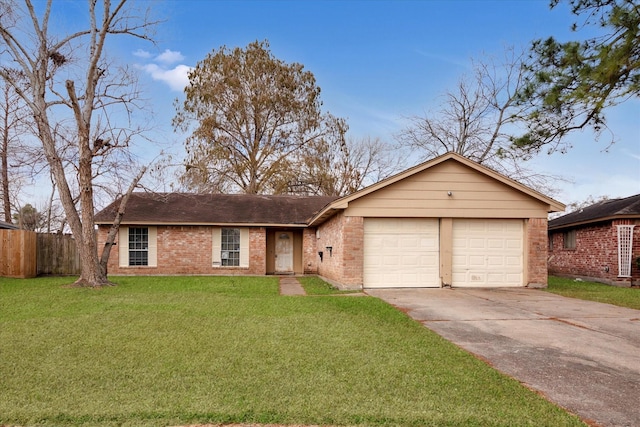 ranch-style home with a garage and a front lawn