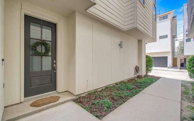 entrance to property with a garage