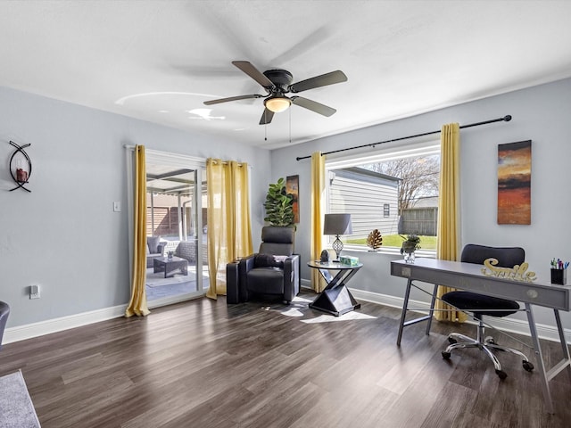 office space with ceiling fan, baseboards, and wood finished floors