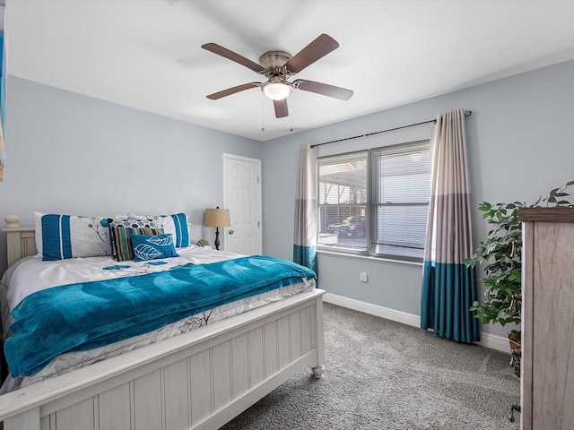 bedroom with carpet flooring, ceiling fan, and baseboards