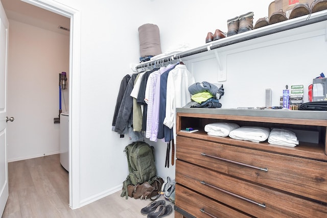 spacious closet with light wood-type flooring