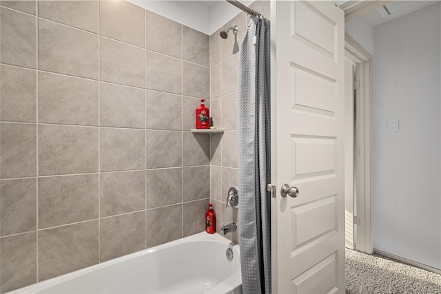 bathroom featuring shower / bathtub combination with curtain