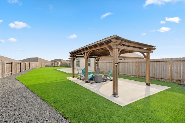 view of yard featuring a patio area and a fenced backyard