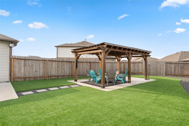 view of yard with a pergola and a patio area