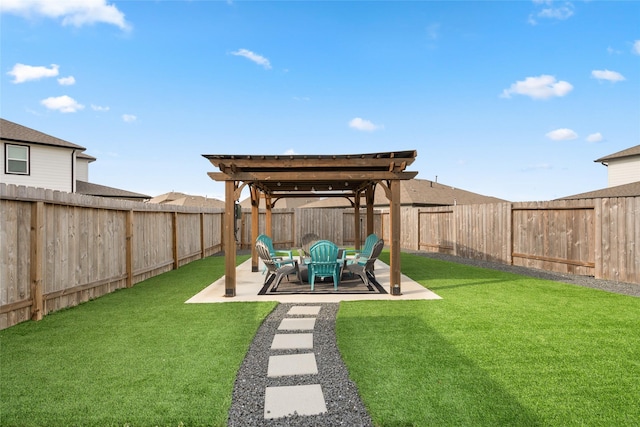 view of yard with a patio area and a fenced backyard