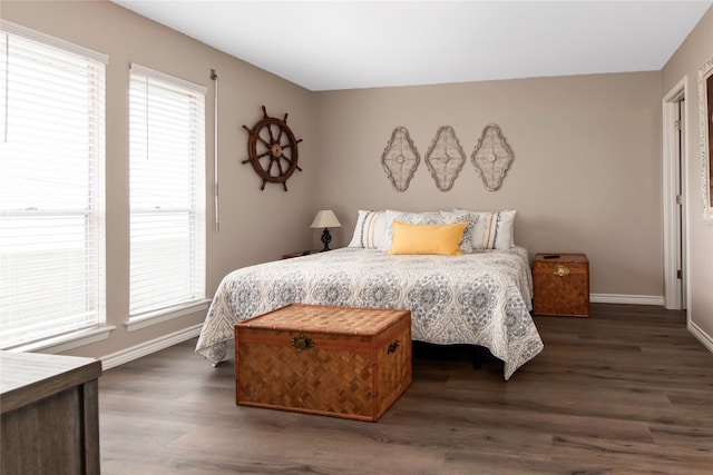 bedroom featuring dark hardwood / wood-style flooring