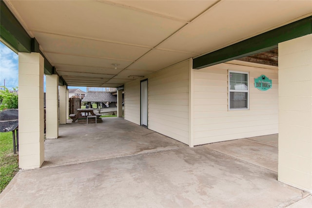 view of patio / terrace featuring a carport