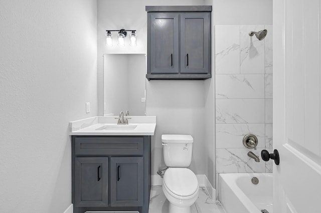 full bathroom featuring vanity, toilet, and tiled shower / bath