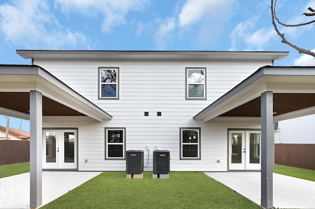 back of property featuring central AC, a patio area, and french doors