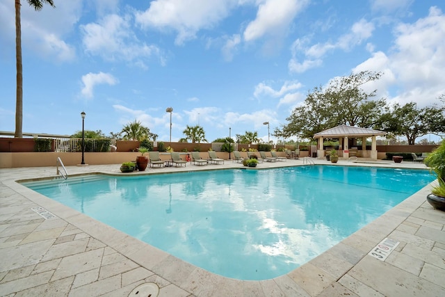 view of pool featuring a gazebo and a patio area