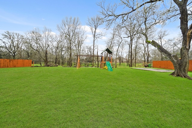 view of yard with a playground