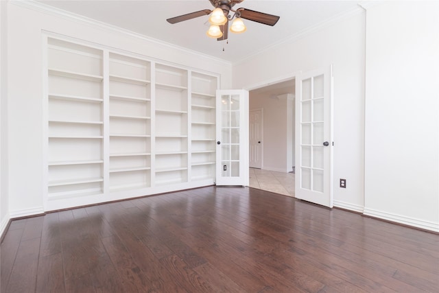 unfurnished room with wood-type flooring, ornamental molding, ceiling fan, and french doors