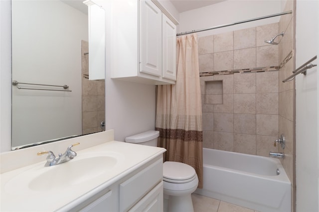 full bathroom with vanity, toilet, tile patterned floors, and shower / bath combo with shower curtain