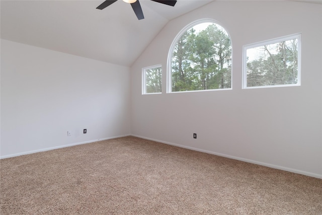 unfurnished room with lofted ceiling, carpet flooring, and ceiling fan