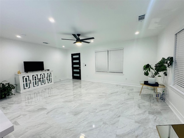 living room with ceiling fan