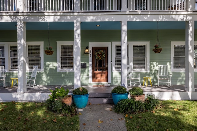 property entrance featuring covered porch