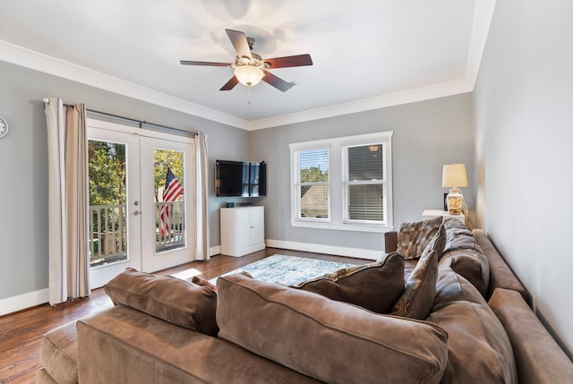 living room with crown molding, wood-type flooring, and french doors