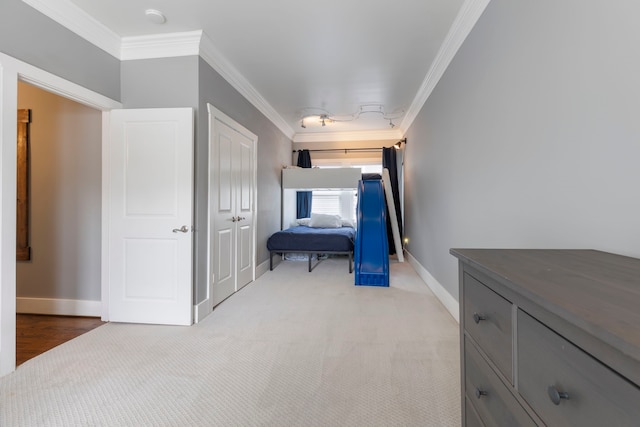 interior space with ornamental molding and carpet flooring