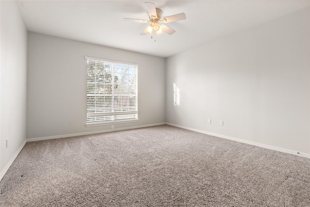 empty room with carpet and ceiling fan