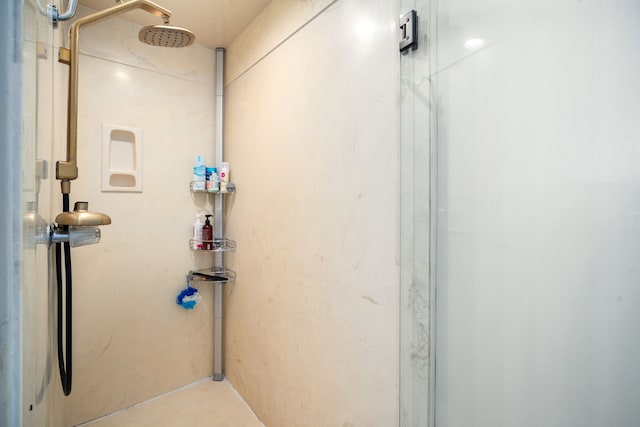 bathroom featuring walk in shower