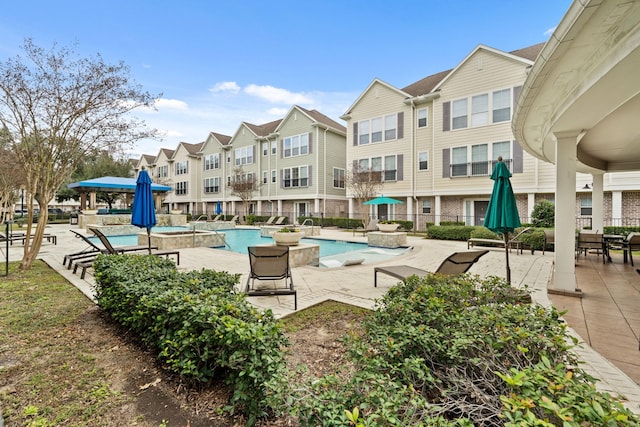 view of swimming pool featuring a patio