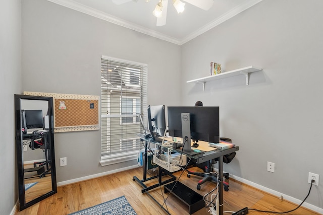 office area with ornamental molding, ceiling fan, and light wood-type flooring