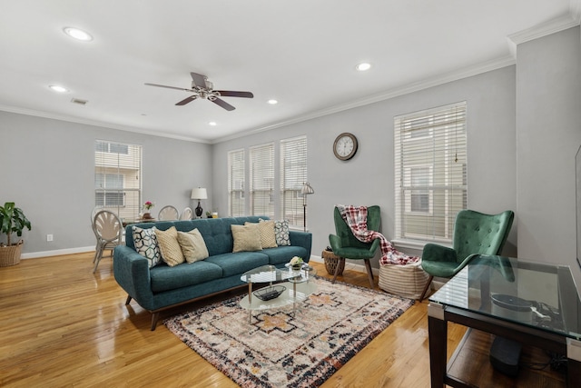 living room with crown molding, ceiling fan, and wood-type flooring