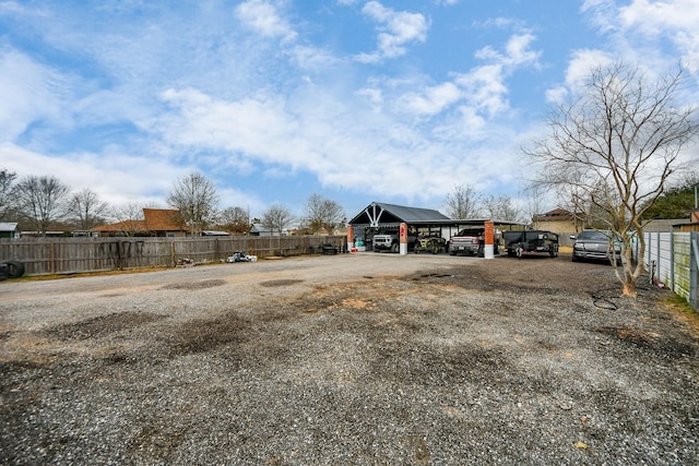 exterior space with a carport